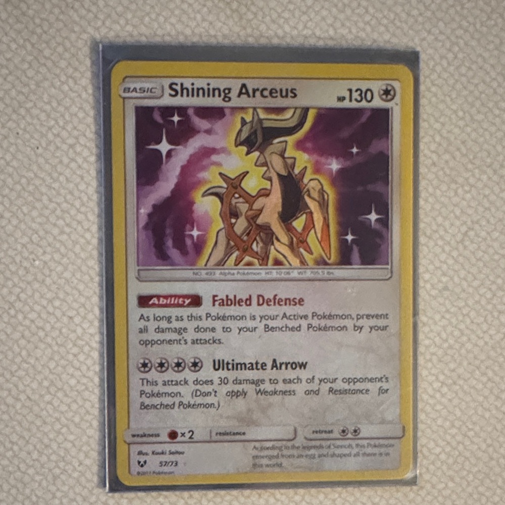 Pokemon Shining Arceus Card with Gold and Purple